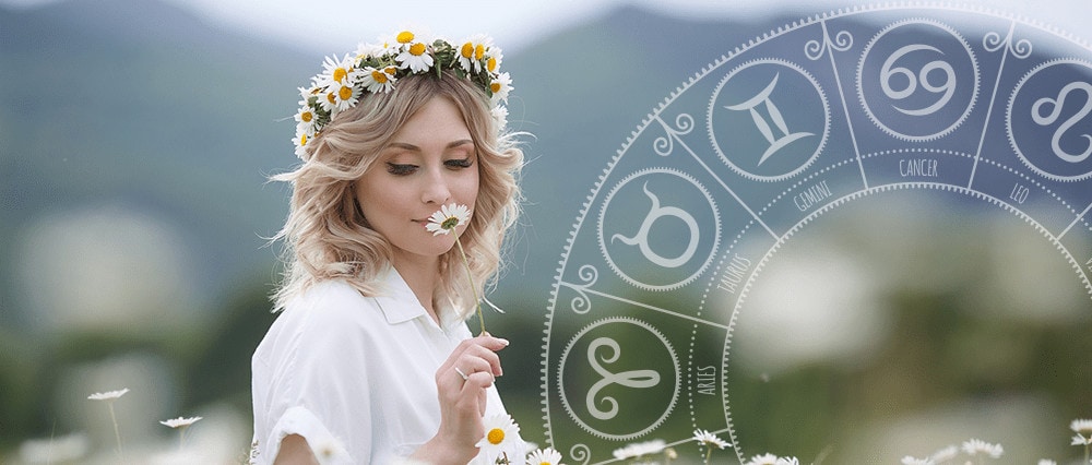 woman with flower and zodiac birth sign chart