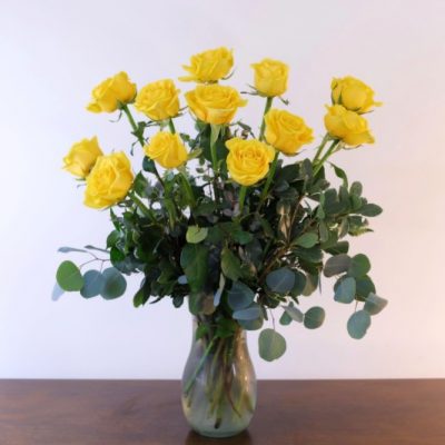 one dozen yellow roses lush