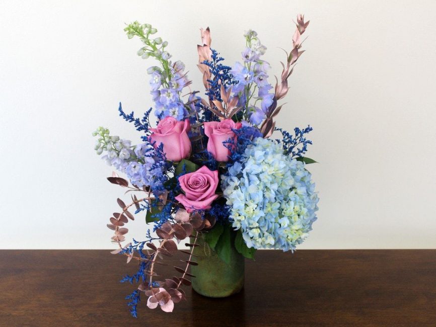 Aquarius bouquet with sky blue and lilac flowers by Studley Flower Gardens