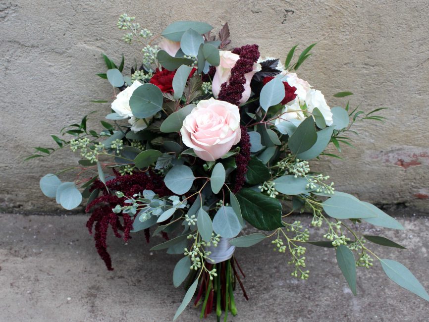 Heirloom rose bouquet with pink roses and burgundy accents by Studley Flower Gardens